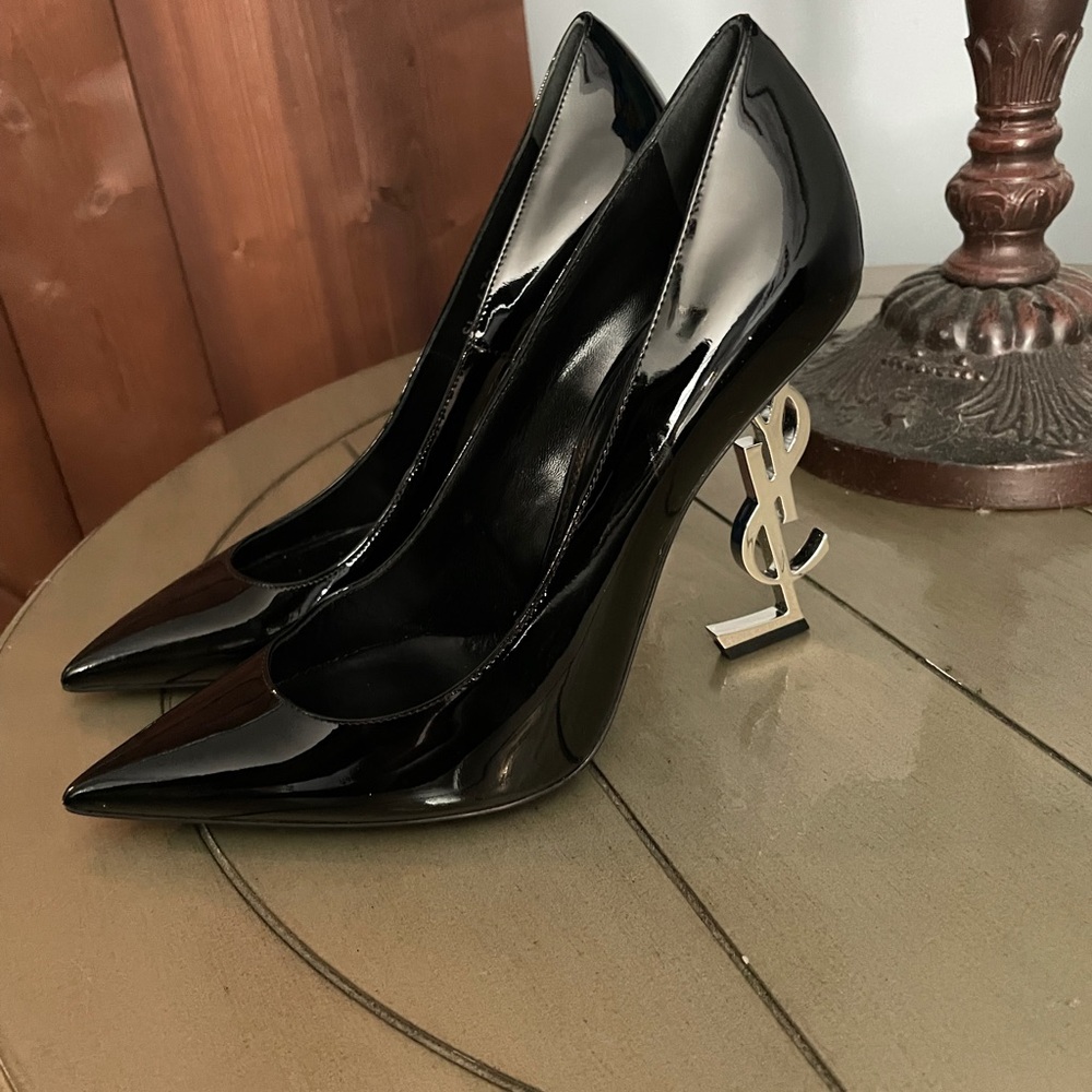 Black, used and in great condition. Only worn once indoors never worn outside.
